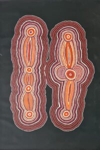 Black background, ochre coloured shapes seven sisters dreaming painting